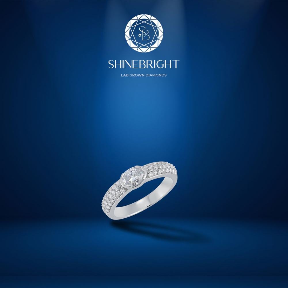 East-west oval bezel pavé ring